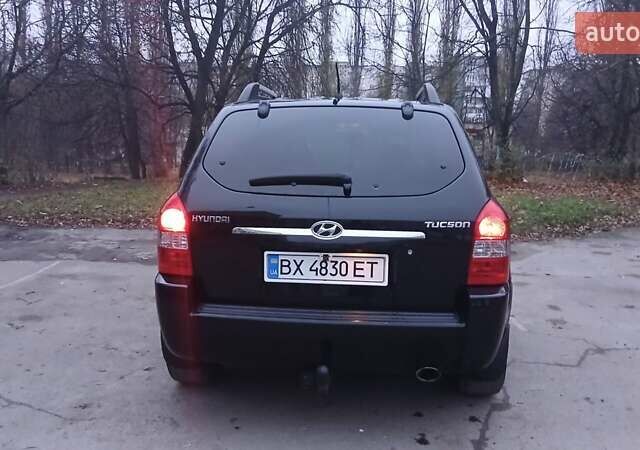Черный Хендай Туксон, объемом двигателя 1.98 л и пробегом 320 тыс. км за 6300 $, фото 12 на Automoto.ua