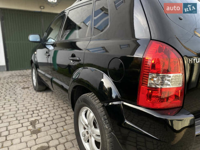 Чорний Хендай Туксон, об'ємом двигуна 1.98 л та пробігом 233 тис. км за 7650 $, фото 18 на Automoto.ua
