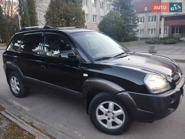 Чорний Хендай Туксон, об'ємом двигуна 1.99 л та пробігом 239 тис. км за 6990 $, фото 4 на Automoto.ua