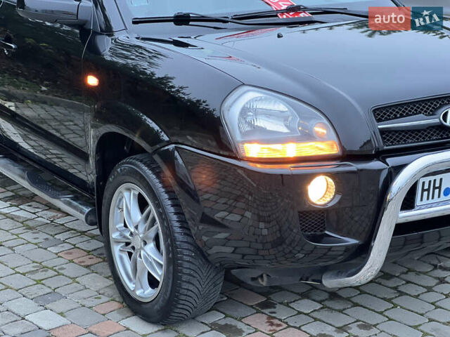 Чорний Хендай Туксон, об'ємом двигуна 1.98 л та пробігом 170 тис. км за 6999 $, фото 24 на Automoto.ua