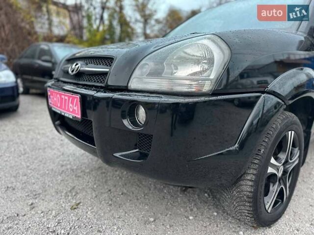 Чорний Хендай Туксон, об'ємом двигуна 2 л та пробігом 167 тис. км за 7950 $, фото 20 на Automoto.ua