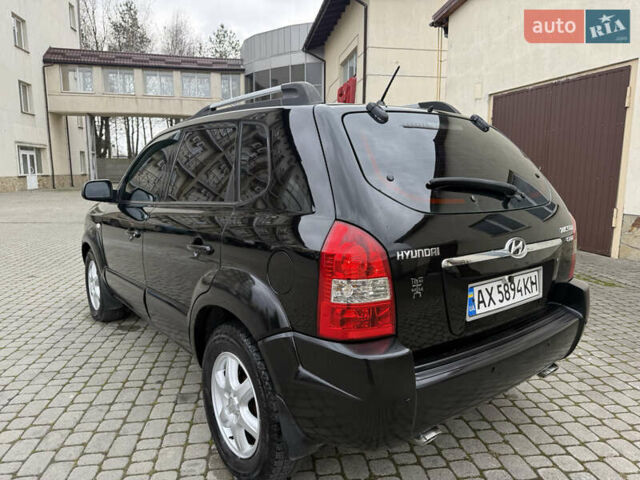Черный Хендай Туксон, объемом двигателя 1.98 л и пробегом 250 тыс. км за 7150 $, фото 10 на Automoto.ua