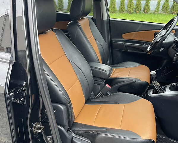 Черный Хендай Туксон, объемом двигателя 2 л и пробегом 216 тыс. км за 7500 $, фото 32 на Automoto.ua