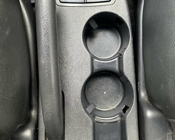 Черный Хендай Туксон, объемом двигателя 1.99 л и пробегом 290 тыс. км за 7700 $, фото 13 на Automoto.ua