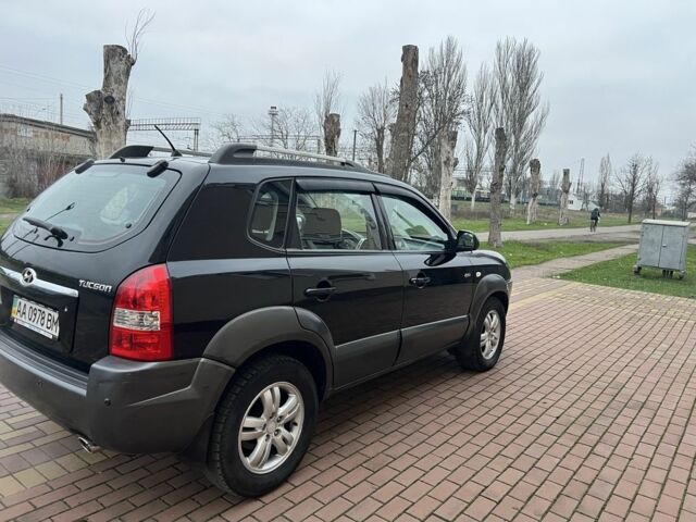 Черный Хендай Туксон, объемом двигателя 2 л и пробегом 220 тыс. км за 7200 $, фото 14 на Automoto.ua