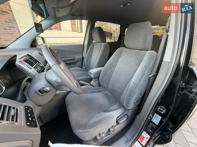 Черный Хендай Туксон, объемом двигателя 2 л и пробегом 249 тыс. км за 7450 $, фото 17 на Automoto.ua