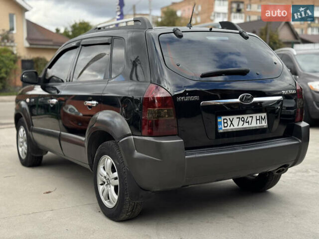 Чорний Хендай Туксон, об'ємом двигуна 2 л та пробігом 230 тис. км за 6999 $, фото 8 на Automoto.ua