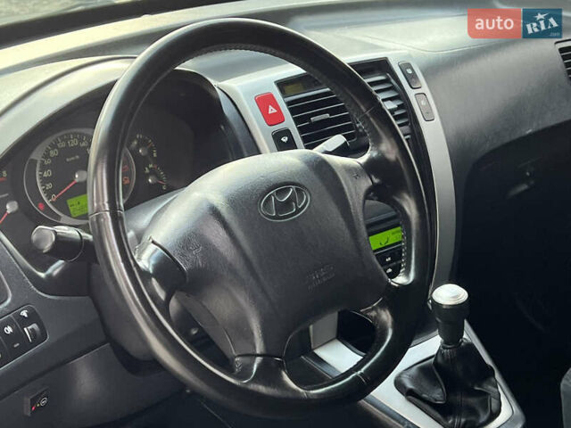 Хендай Туксон 2006 у Тернополі на Automoto.ua Чорний Хендай Туксон, об'ємом двигуна 2 л та пробігом 240 тис. км за 6699 $, фото 33 на Automoto.ua