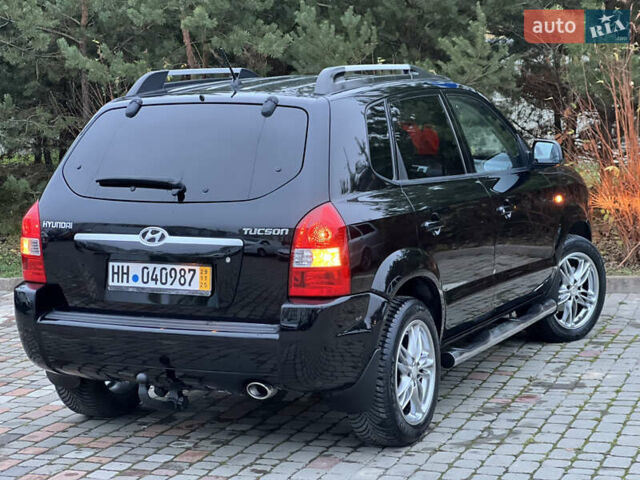 Чорний Хендай Туксон, об'ємом двигуна 1.98 л та пробігом 170 тис. км за 6999 $, фото 57 на Automoto.ua