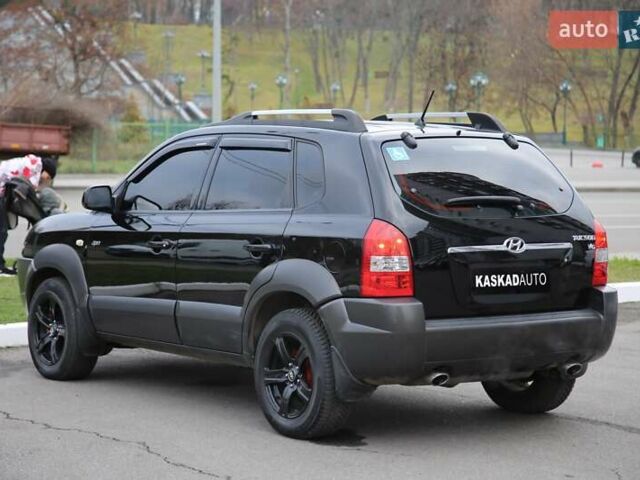 Черный Хендай Туксон, объемом двигателя 2.66 л и пробегом 217 тыс. км за 8600 $, фото 3 на Automoto.ua