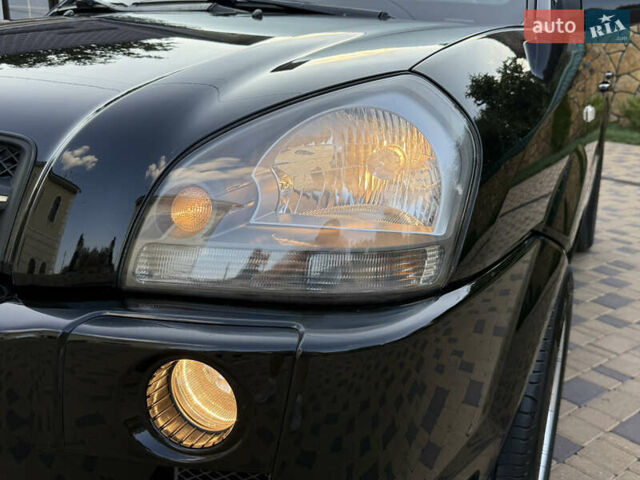 Чорний Хендай Туксон, об'ємом двигуна 1.98 л та пробігом 212 тис. км за 8200 $, фото 41 на Automoto.ua