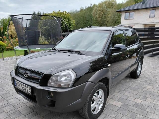 Черный Хендай Туксон, объемом двигателя 2 л и пробегом 233 тыс. км за 7000 $, фото 2 на Automoto.ua