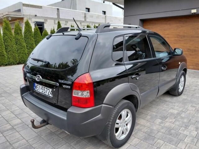 Черный Хендай Туксон, объемом двигателя 2 л и пробегом 298 тыс. км за 2200 $, фото 2 на Automoto.ua