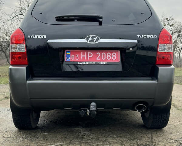 Черный Хендай Туксон, объемом двигателя 2 л и пробегом 201 тыс. км за 7750 $, фото 8 на Automoto.ua