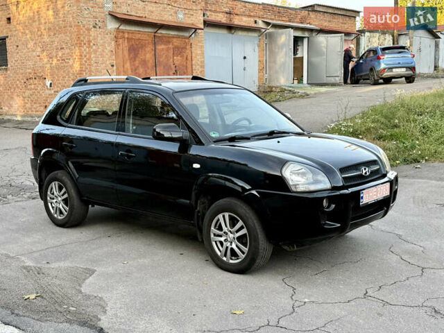 Черный Хендай Туксон, объемом двигателя 2 л и пробегом 189 тыс. км за 7150 $, фото 1 на Automoto.ua