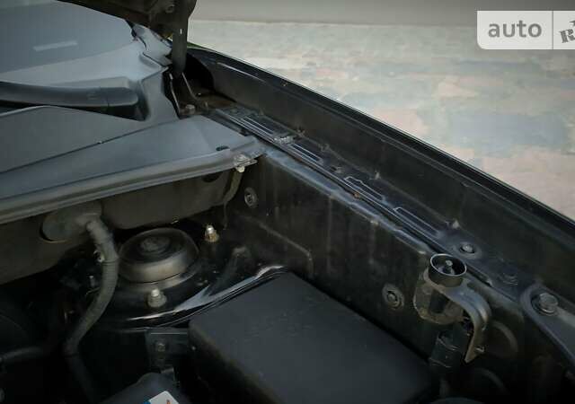 Чорний Хендай Туксон, об'ємом двигуна 2 л та пробігом 229 тис. км за 8550 $, фото 173 на Automoto.ua