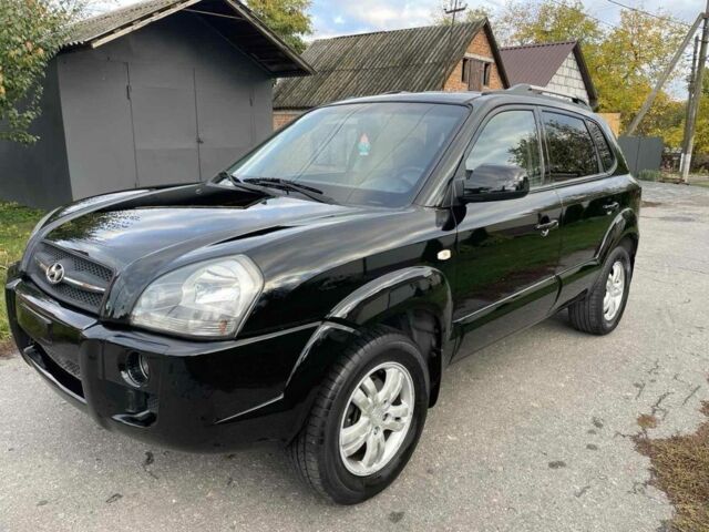 Черный Хендай Туксон, объемом двигателя 2 л и пробегом 163 тыс. км за 7700 $, фото 1 на Automoto.ua
