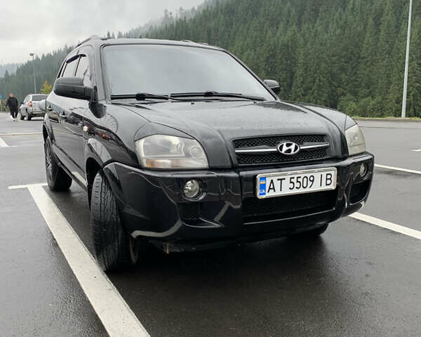Черный Хендай Туксон, объемом двигателя 2 л и пробегом 277 тыс. км за 7900 $, фото 6 на Automoto.ua