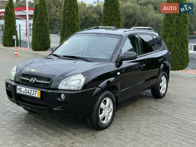 Чорний Хендай Туксон, об'ємом двигуна 2 л та пробігом 204 тис. км за 7750 $, фото 4 на Automoto.ua