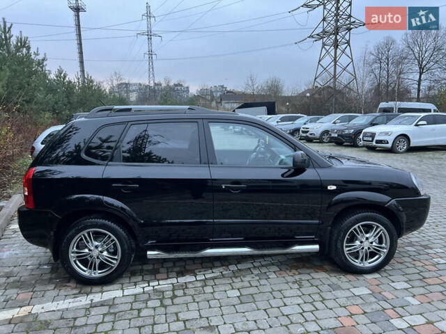 Чорний Хендай Туксон, об'ємом двигуна 1.98 л та пробігом 170 тис. км за 6999 $, фото 33 на Automoto.ua