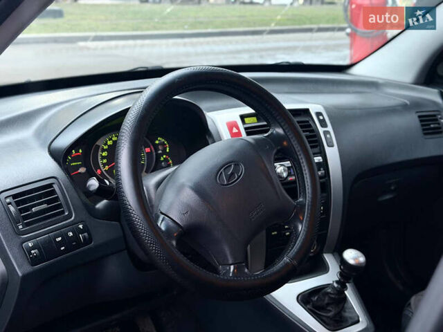 Чорний Хендай Туксон, об'ємом двигуна 1.99 л та пробігом 310 тис. км за 6399 $, фото 16 на Automoto.ua