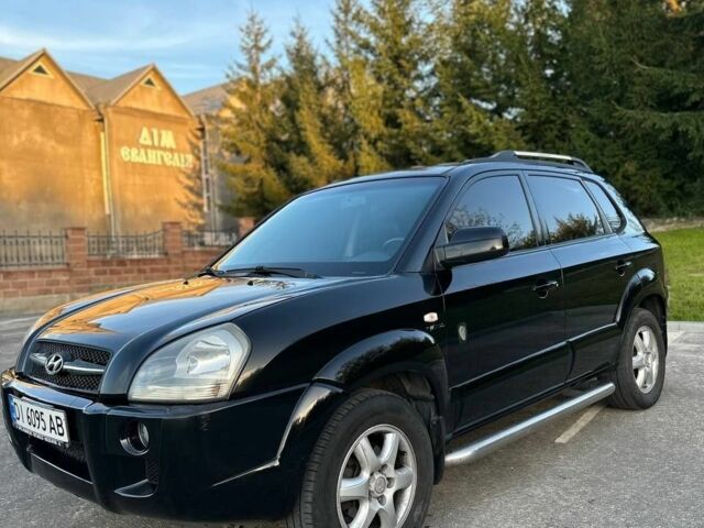 Чорний Хендай Туксон, об'ємом двигуна 2 л та пробігом 235 тис. км за 6700 $, фото 2 на Automoto.ua