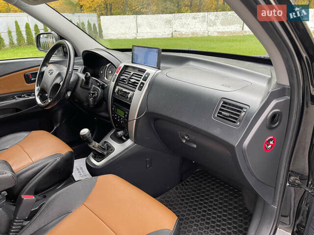 Черный Хендай Туксон, объемом двигателя 2 л и пробегом 216 тыс. км за 7500 $, фото 33 на Automoto.ua
