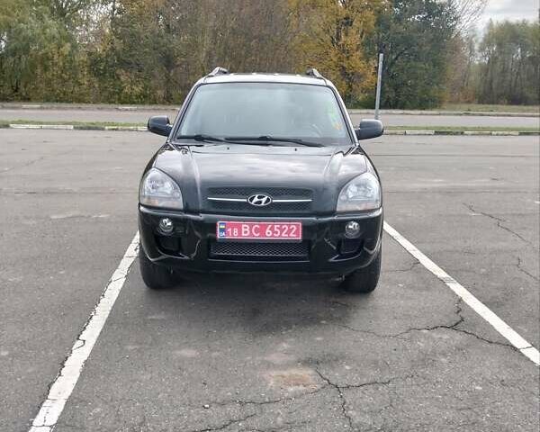Черный Хендай Туксон, объемом двигателя 2 л и пробегом 127 тыс. км за 7590 $, фото 22 на Automoto.ua