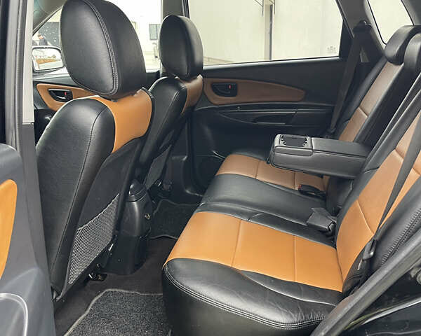 Черный Хендай Туксон, объемом двигателя 2 л и пробегом 216 тыс. км за 7500 $, фото 20 на Automoto.ua