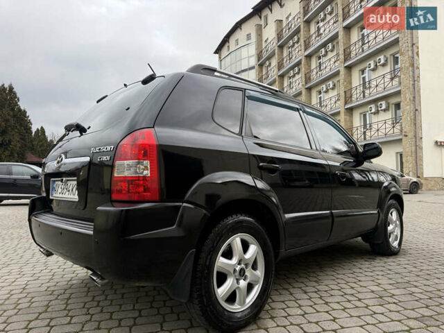 Черный Хендай Туксон, объемом двигателя 1.98 л и пробегом 250 тыс. км за 7150 $, фото 6 на Automoto.ua