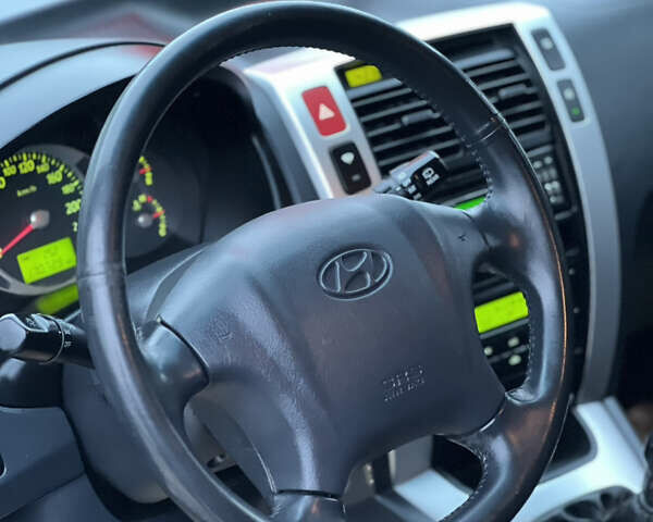 Чорний Хендай Туксон, об'ємом двигуна 1.98 л та пробігом 170 тис. км за 6999 $, фото 37 на Automoto.ua