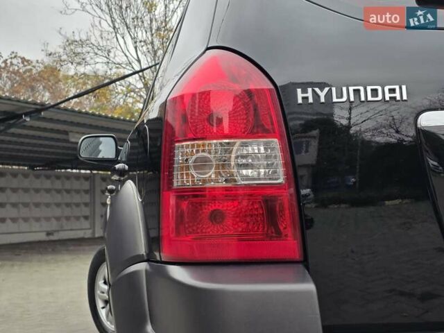Чорний Хендай Туксон, об'ємом двигуна 1.98 л та пробігом 123 тис. км за 7950 $, фото 4 на Automoto.ua