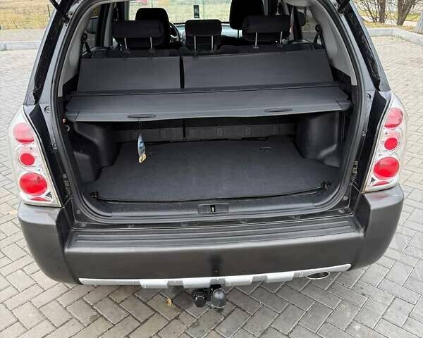 Чорний Хендай Туксон, об'ємом двигуна 2 л та пробігом 124 тис. км за 7950 $, фото 13 на Automoto.ua