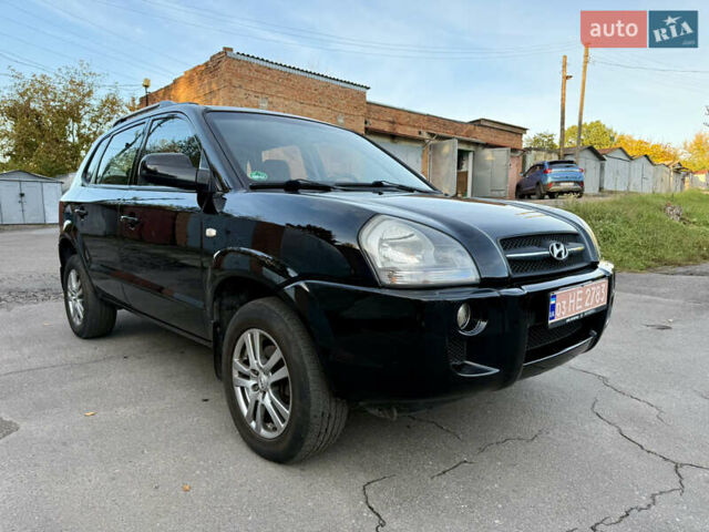 Черный Хендай Туксон, объемом двигателя 2 л и пробегом 189 тыс. км за 7150 $, фото 3 на Automoto.ua