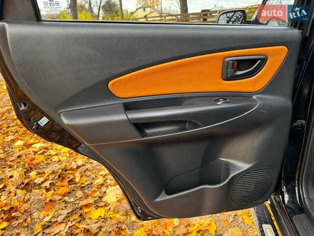 Черный Хендай Туксон, объемом двигателя 2 л и пробегом 210 тыс. км за 7990 $, фото 24 на Automoto.ua
