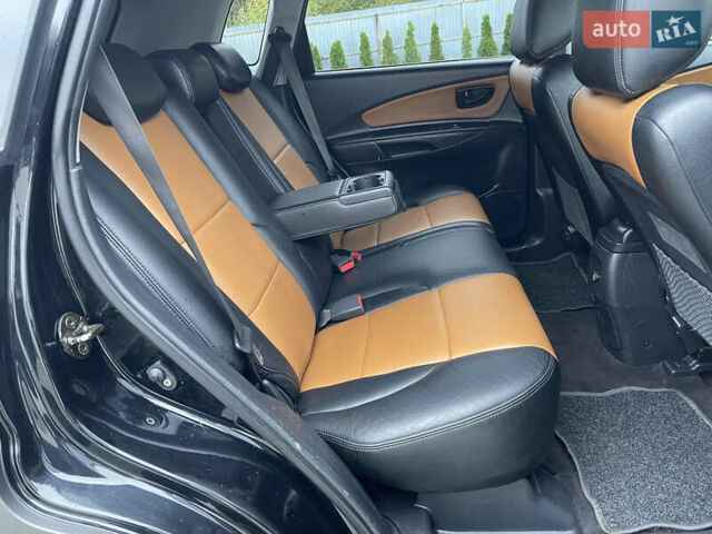 Черный Хендай Туксон, объемом двигателя 2 л и пробегом 216 тыс. км за 7500 $, фото 28 на Automoto.ua