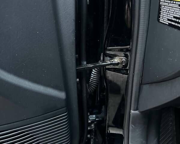 Чорний Хендай Туксон, об'ємом двигуна 2 л та пробігом 167 тис. км за 7950 $, фото 15 на Automoto.ua