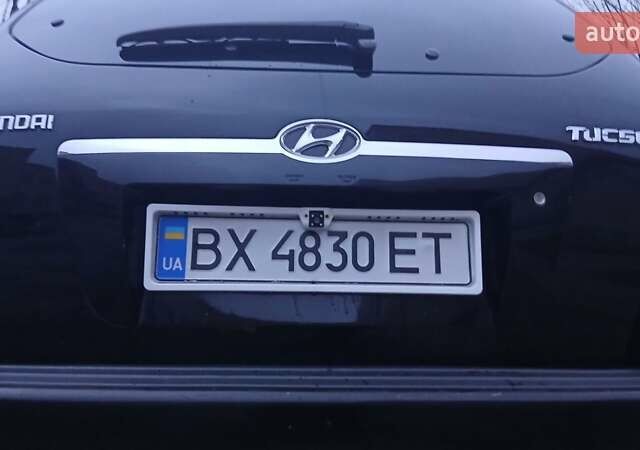 Черный Хендай Туксон, объемом двигателя 1.98 л и пробегом 320 тыс. км за 6300 $, фото 13 на Automoto.ua