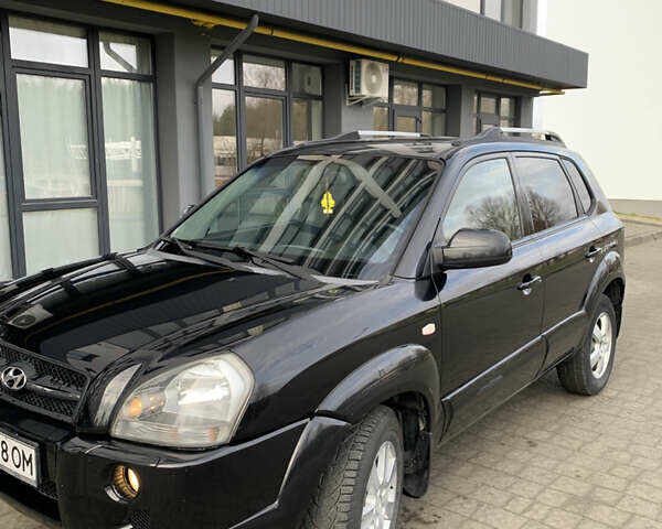 Черный Хендай Туксон, объемом двигателя 1.99 л и пробегом 290 тыс. км за 7700 $, фото 16 на Automoto.ua