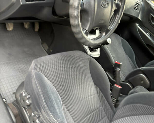 Хендай Туксон 2006 у Тернополі на Automoto.ua Чорний Хендай Туксон, об'ємом двигуна 1.99 л та пробігом 240 тис. км за 7600 $, фото 22 на Automoto.ua