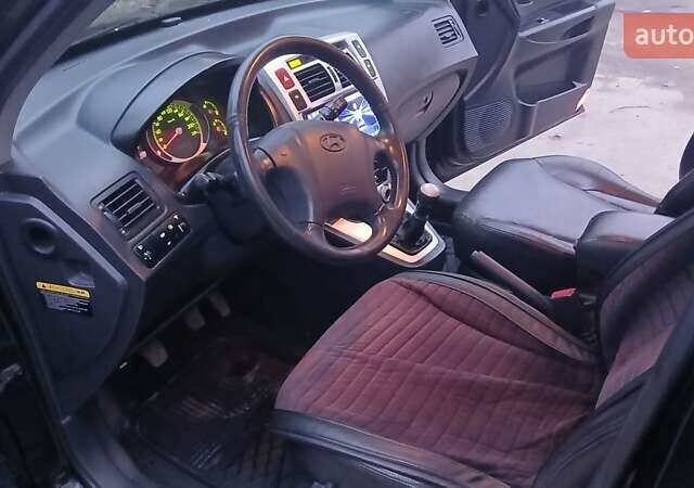 Чорний Хендай Туксон, об'ємом двигуна 1.98 л та пробігом 320 тис. км за 6500 $, фото 19 на Automoto.ua