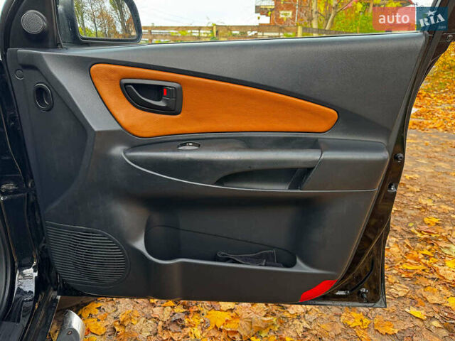 Черный Хендай Туксон, объемом двигателя 2 л и пробегом 210 тыс. км за 7990 $, фото 27 на Automoto.ua