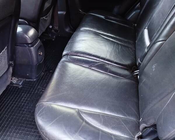 Черный Хендай Туксон, объемом двигателя 2.7 л и пробегом 290 тыс. км за 7300 $, фото 3 на Automoto.ua