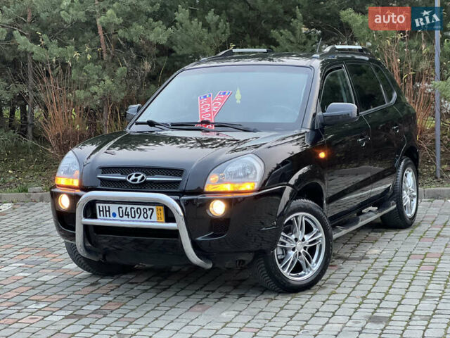 Чорний Хендай Туксон, об'ємом двигуна 1.98 л та пробігом 170 тис. км за 6999 $, фото 3 на Automoto.ua