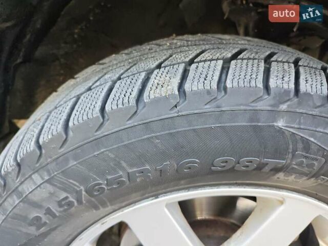 Черный Хендай Туксон, объемом двигателя 2 л и пробегом 247 тыс. км за 6300 $, фото 10 на Automoto.ua