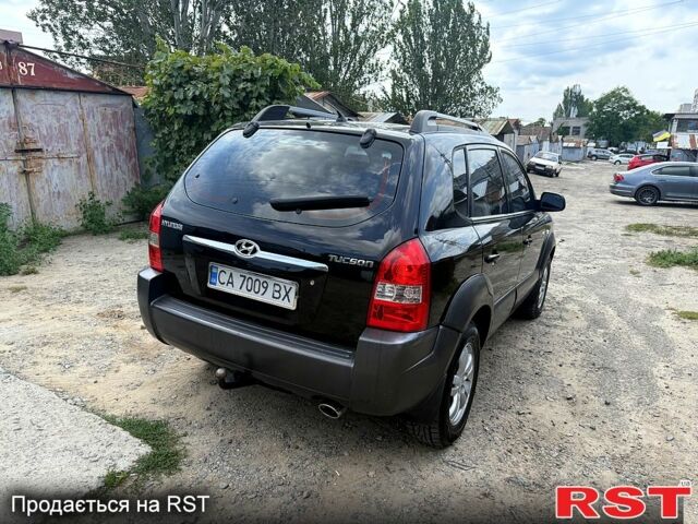 Чорний Хендай Туксон, об'ємом двигуна 2 л та пробігом 254 тис. км за 7650 $, фото 6 на Automoto.ua