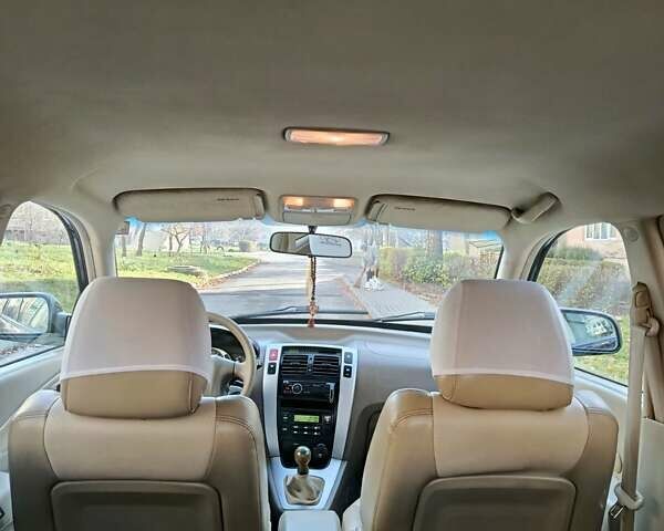 Черный Хендай Туксон, объемом двигателя 1.98 л и пробегом 256 тыс. км за 8000 $, фото 5 на Automoto.ua