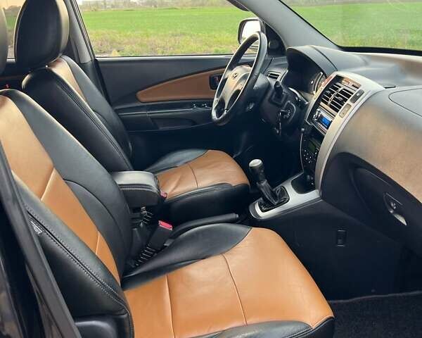 Черный Хендай Туксон, объемом двигателя 2 л и пробегом 168 тыс. км за 8000 $, фото 21 на Automoto.ua