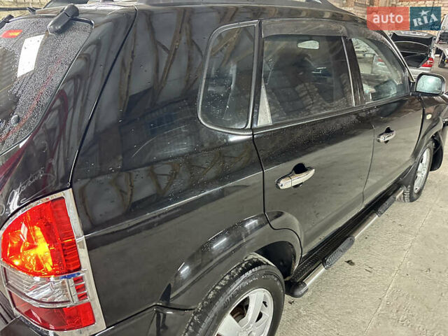 Чорний Хендай Туксон, об'ємом двигуна 2 л та пробігом 252 тис. км за 3000 $, фото 8 на Automoto.ua