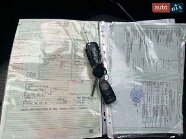 Черный Хендай Туксон, объемом двигателя 2 л и пробегом 194 тыс. км за 7250 $, фото 26 на Automoto.ua